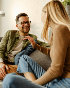 couple on couch talking