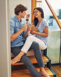 couple talking on stairs couple talking on stairs