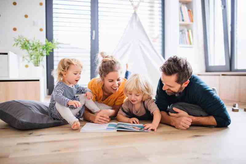 young-family-with-two-small-children-indoors-in-be-2023-11-27-05-35-10-utc